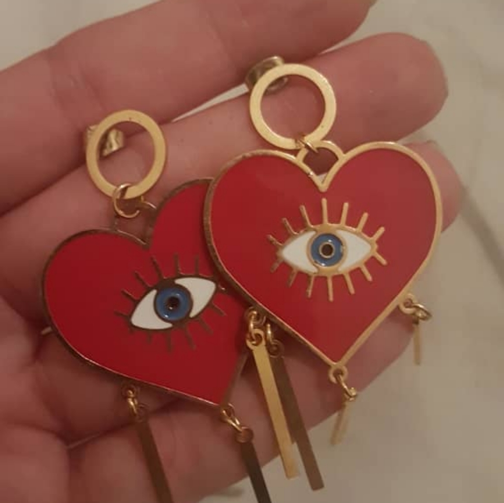 Red eye earrings